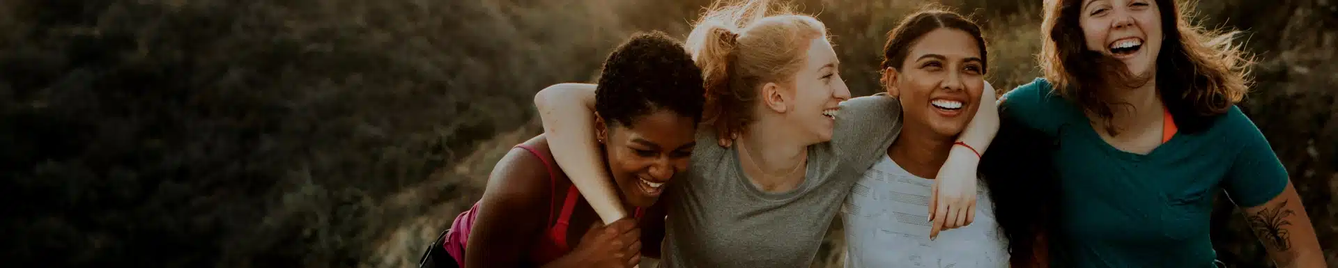 image of four women smillling