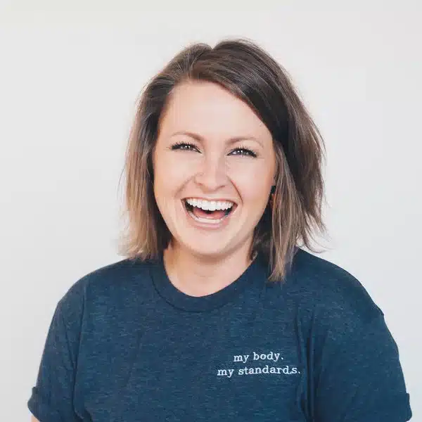 image of woman smilling in tshirt